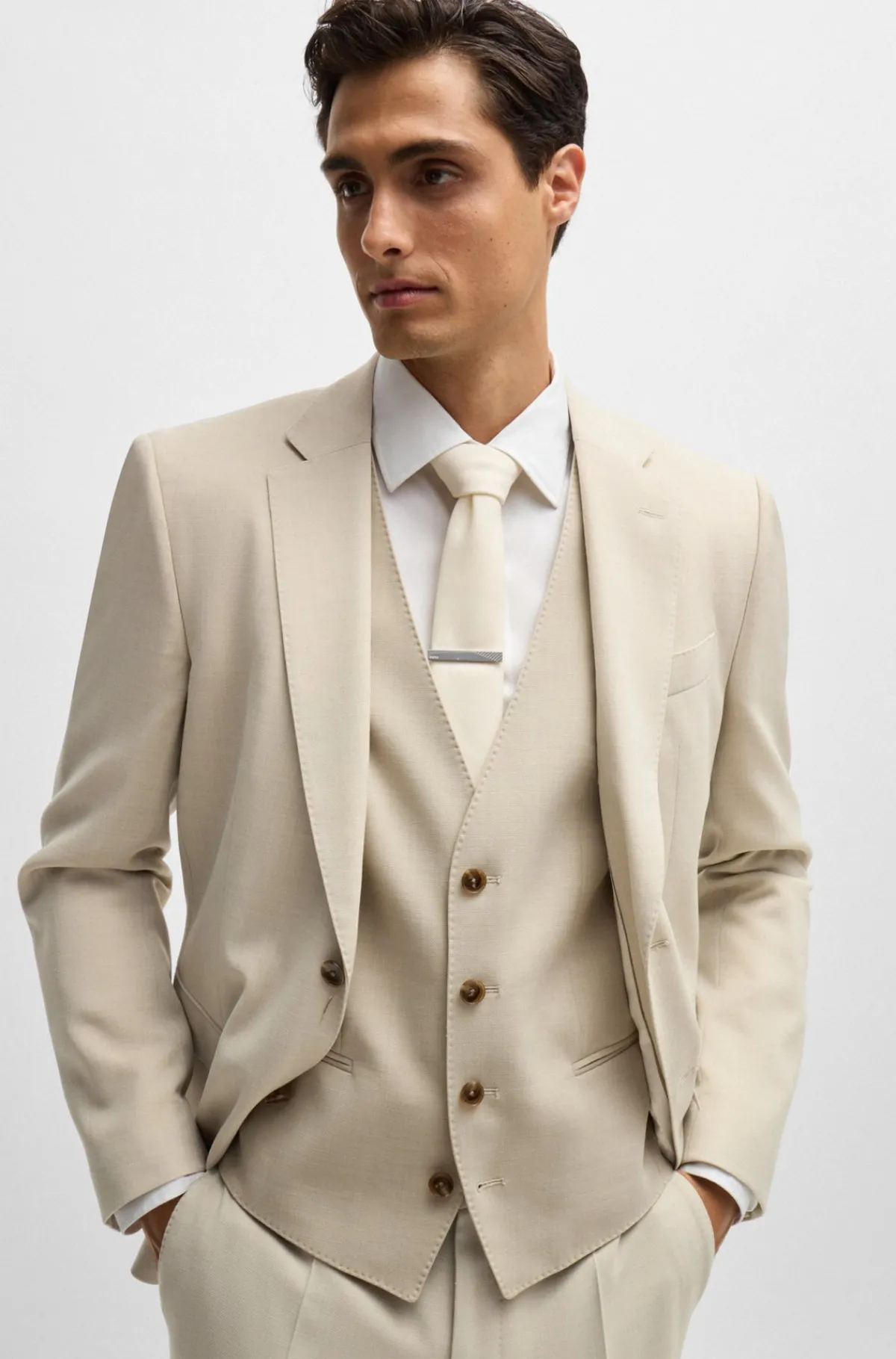 jakkest_i_tre_dele_i_slim_fit_af_stof_med_mikromnster_3.webp HUGO BOSS Jakkesæt I Tre Dele I Slim Fit Af Stof Med Mikromønster Lys beige Clearance