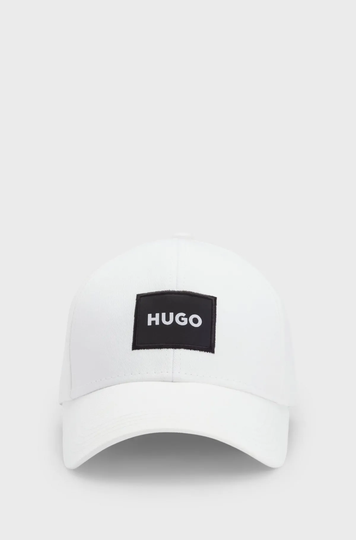 kasket_i_bomuldstwill_med_logomrkat_2-1.webp HUGO BOSS Kasket I Bomuldstwill Med Logomærkat Hvid Fashion